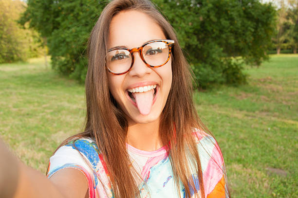 istock Young attractive woman taking a selfie 601373574