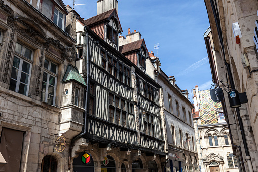 Dijon, France - September 3, 2016: ancient half-timbered houses in Dijon, France. Dijon is a city in eastern France, capital of the Burgundy region.