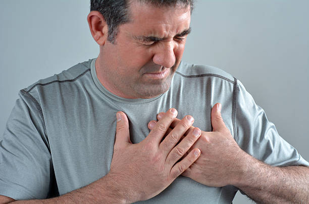 istock Man having acute pain in a his chest 601377102