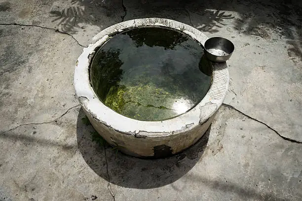 very old and typical Thai style water pool using in all village in Thailand