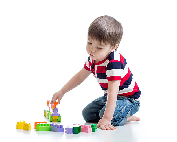 istock child boy playing block toys 601377888