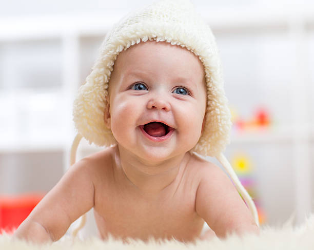 istock Cute little baby looking into the camera and weared in 601379302