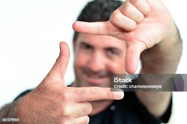 Happy Mature Man Creating Frame With Fingers Stock Photo - Download Image Now - Accuracy, Adult, Adults Only