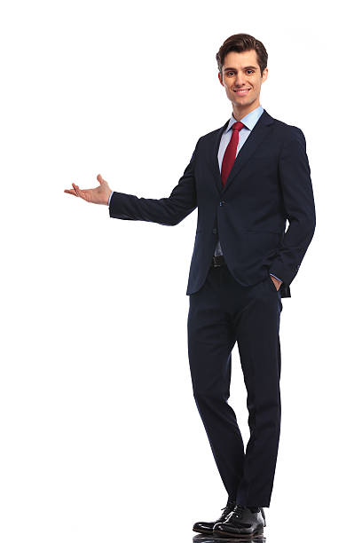 istock happy businessman presenting something 601380684