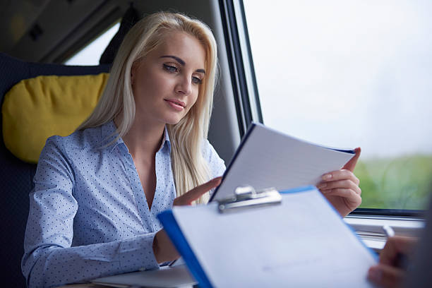 istock Busy woman on the train 601381874