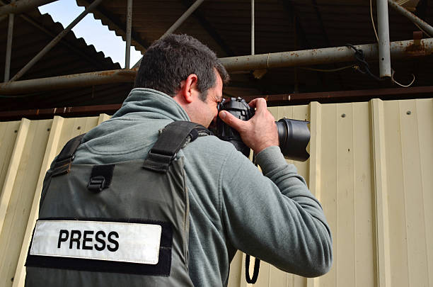 istock Professional Photojournalist 601382512