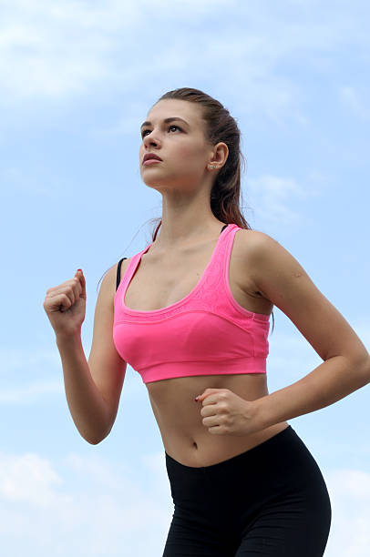 istock Bottom view of a girl practicing in race walking 601382514