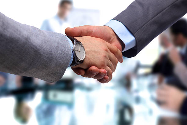 istock Business meeting at office. handshake in 601384336