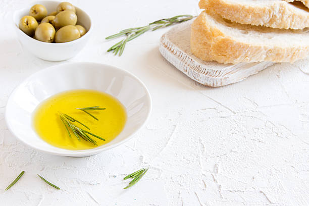 istock olive oil with rosemary and bread 601384592