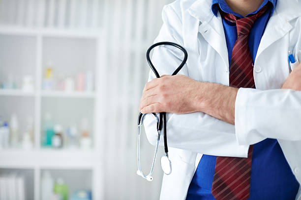 istock Doctor holding stethoscope in his hand 601385416