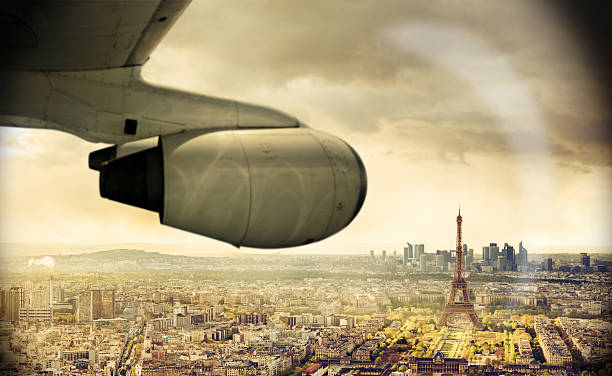 istock Travel by plane to Paris, view on Eiffel Tower 601387098