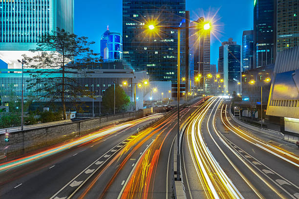 istock blurred traffic in downtown district,hong kong,china 601387908