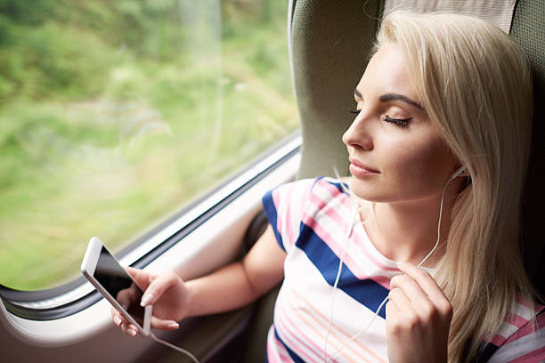 istock Woman relaxing with good music 601394090
