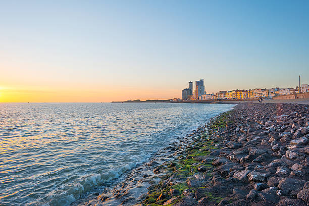 istock City along a sea at sunset in summer 601395052