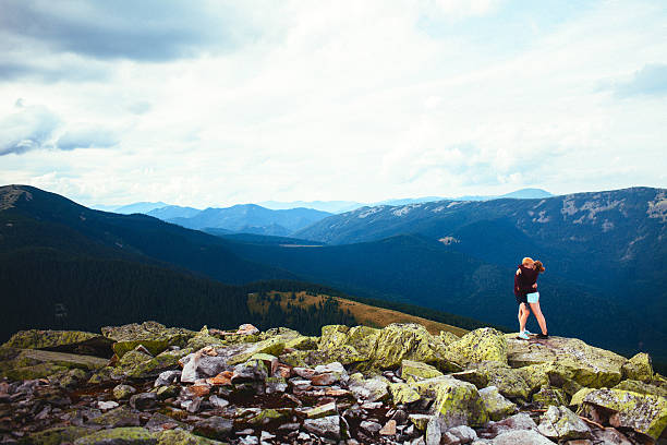 istock Couple in mountains 601395120