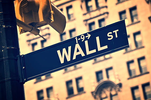 istock Wall street direction sign, New York vintage process 601396626