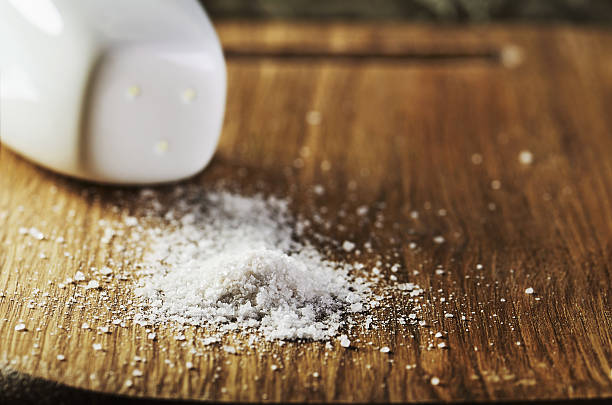 istock salt heap on a cutting board close-up 601399846