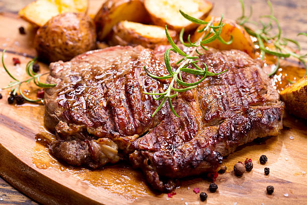 istock grilled meat with rosemary 601401092