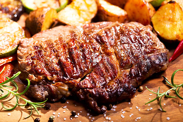 istock grilled meat with rosemary 601401402