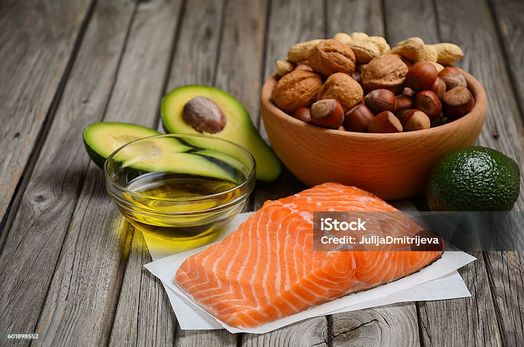 Selection of healthy fat sources Selection of healthy fat sources. Rustic background. Fat - Nutrient Stock Photo