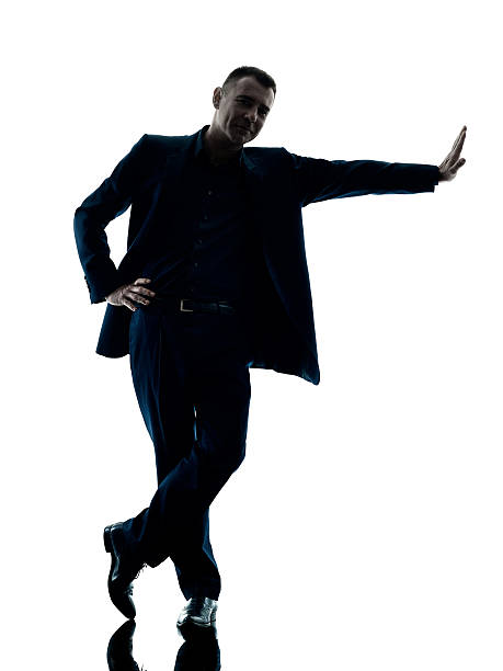 istock business man standing silhouette isolated 601899300