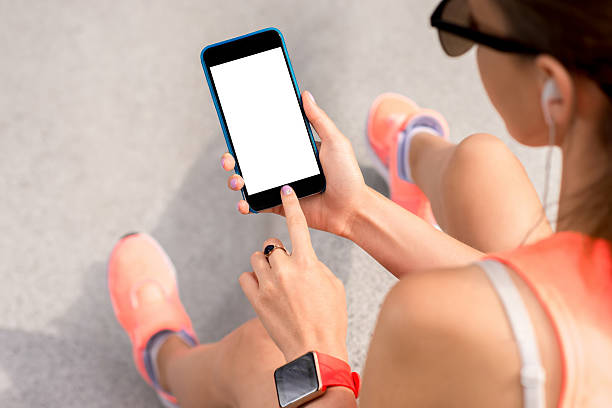 istock Spots woman showing phone screen 601902198