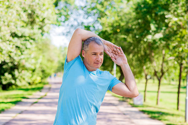 istock Mature man exercise in a city park 601902372