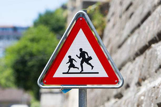 istock Pedestrian danger sign - Red triangle safety traffic sign 601905756