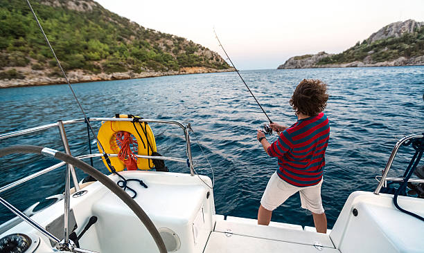 istock The young man on the boat 601905902