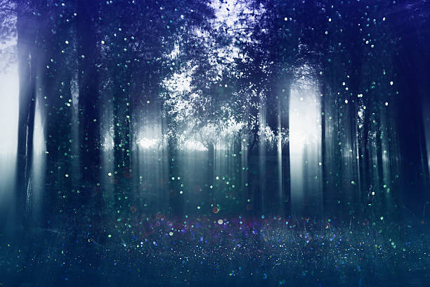 istock Abstract and mysterious background of blurred forest 601907798