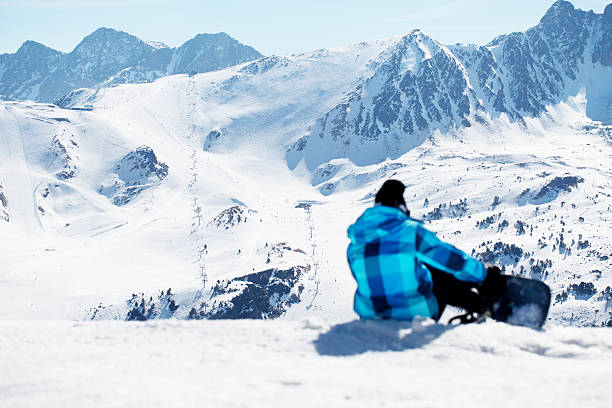 istock Snowboarder enjoying the nature in mountains 601908340
