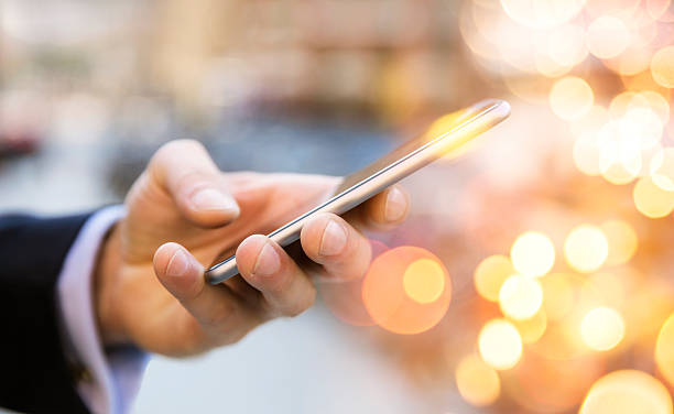 istock Double exposure of man and smart phone 601908916