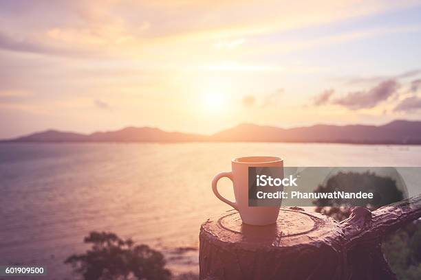 Coffee Cup At Sunset Or Sunrise Beach Stock Photo - Download Image Now - Coffee - Drink, Coffee Cup, Cup