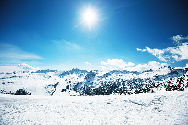 Snowy mountains at sunny day. Canillo ski region, Andorra