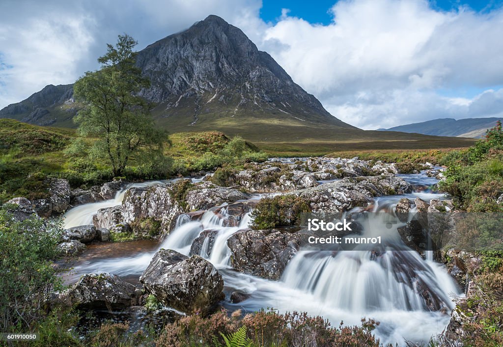 Buachaille Etive Mor and the waterfalls Buachaille Etive Mor in Glencoe  in the highlands of Scotland Scotland Stock Photo