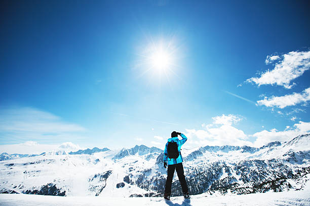 Snowboarder enjoying the nature in mountains stock photo