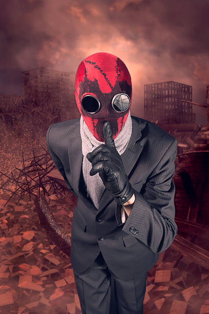 istock Man in a red mask handmade against the background 601912252