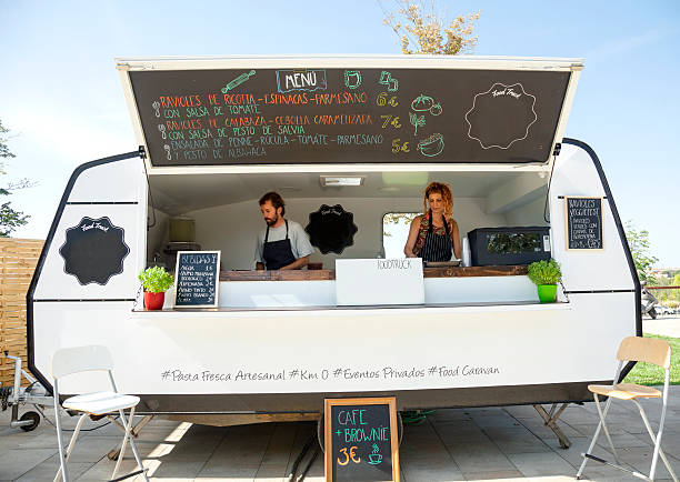 istock Food truck and owners 601913122