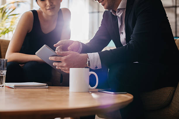 istock Business people having a meeting in office lobby 601913952