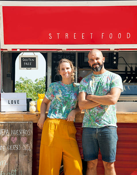 istock Food truck and owners 601914074