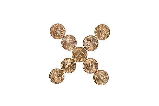 istock Cross made of coins. Isolated on white 601916444