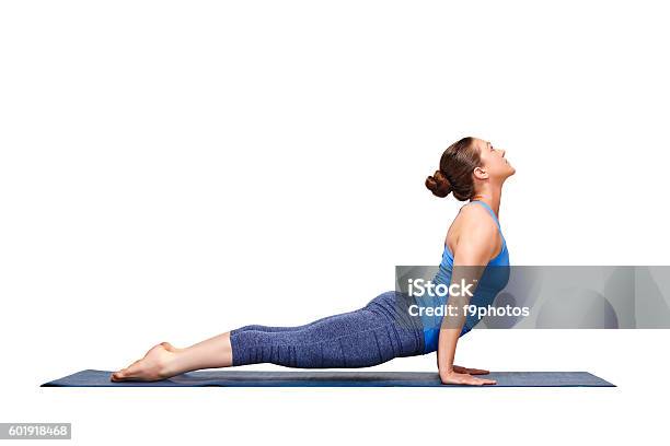 Sporty Fit Yogini Woman Practices Yoga Asana Urdhva Mukha Svanas Stock Photo - Download Image Now