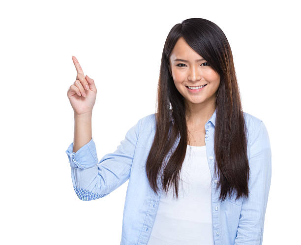 istock Chinese woman pointing 601922360
