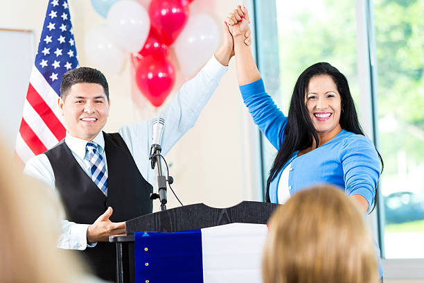 istock City official introducing woman running for local office 601923496