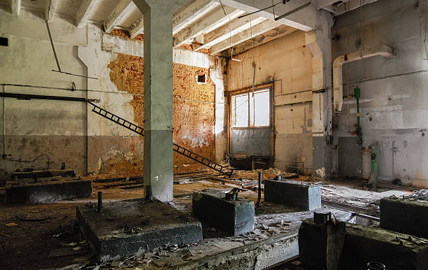 istock Interior of an abandoned factory room 601924250