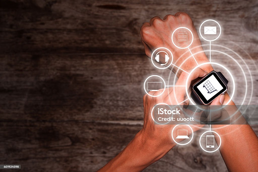 Using smart watch for omnichannel Man wear smart watch in everyday lifestyle. He using smart watch for omnichannel. Concept for business, omnichannel, multi payment and other. Omnichannel Stock Photo