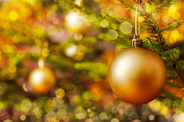 istock Decoration bauble on decorated Christmas tree 601925000