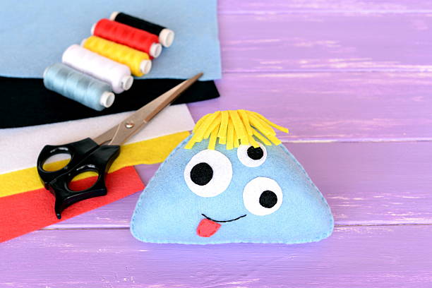 istock Felt monster toy. Happy Halloween crafts 601927088