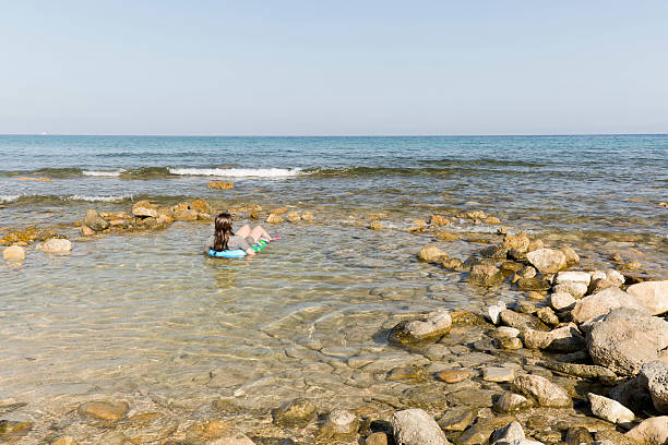 istock teen relaxed on the water 601928038