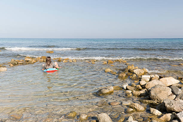 istock teen relaxed on the water 601928080